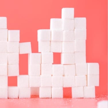 This is a picture of sugar cubes piled up together